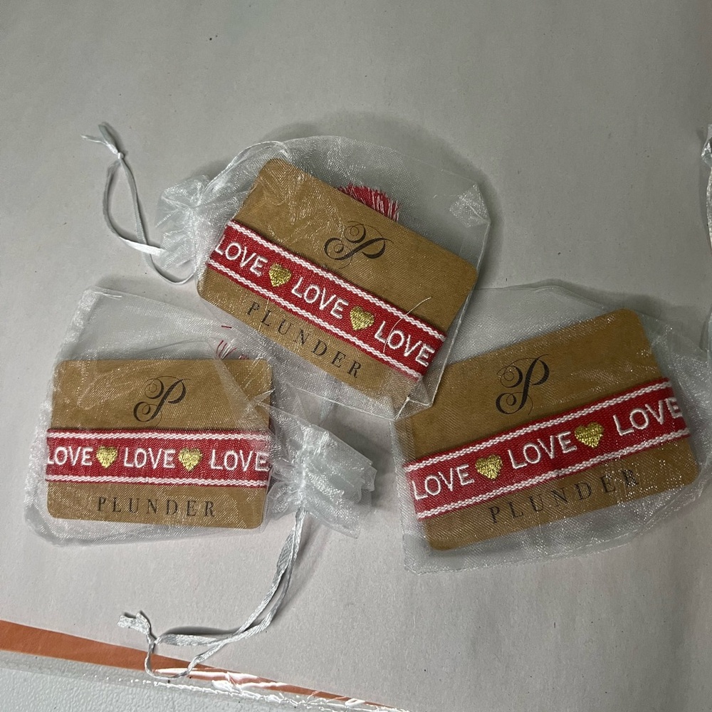 Lot 3..Plunder Tan Bracelet Set with Red and Gold LOVE Ribbon